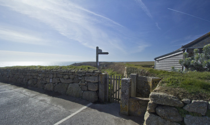 Coastal path signs in Minack theatre car park