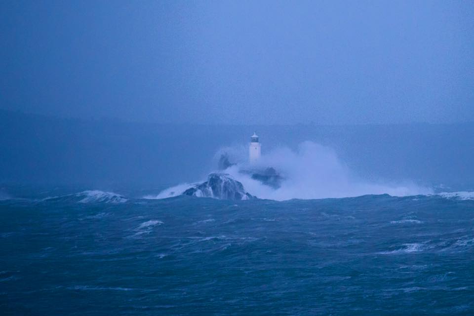 Gwithian lighthouse being pounded by storm imogen - photo © Beachmuser