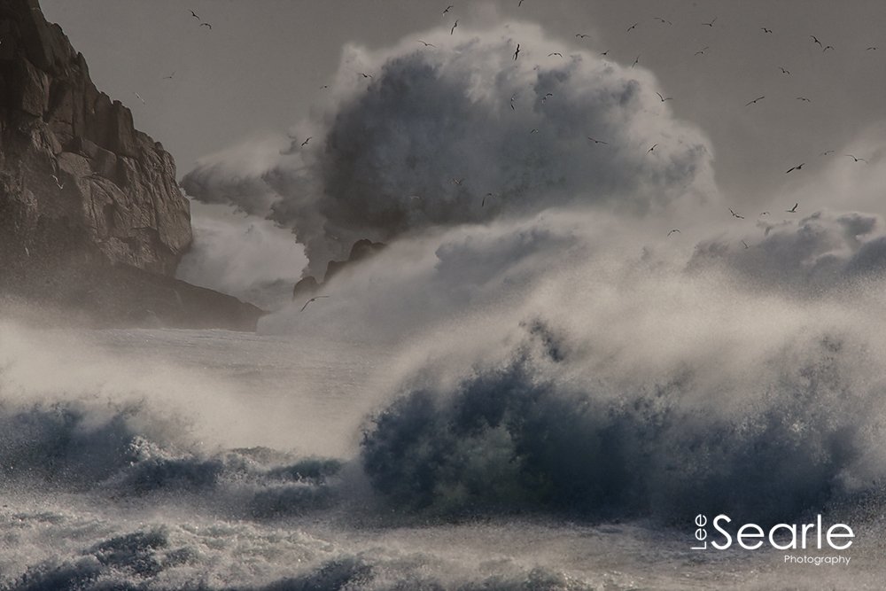 waves from storm imogen crash into the rocks on Porthcurno - photo © Lee Searle